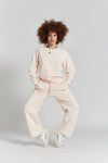 Sitka Blossom-Embroidered Ethical-Cotton Joggers - Shoreline Peach Peachaus