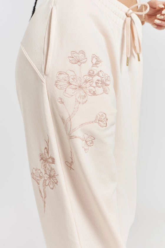 Sitka Blossom-Embroidered Ethical-Cotton Joggers - Shoreline Peach Peachaus