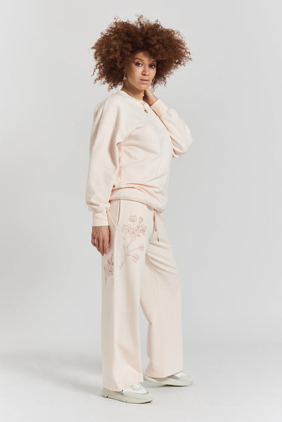 Sitka Blossom-Embroidered Ethical-Cotton Joggers - Shoreline Peach
