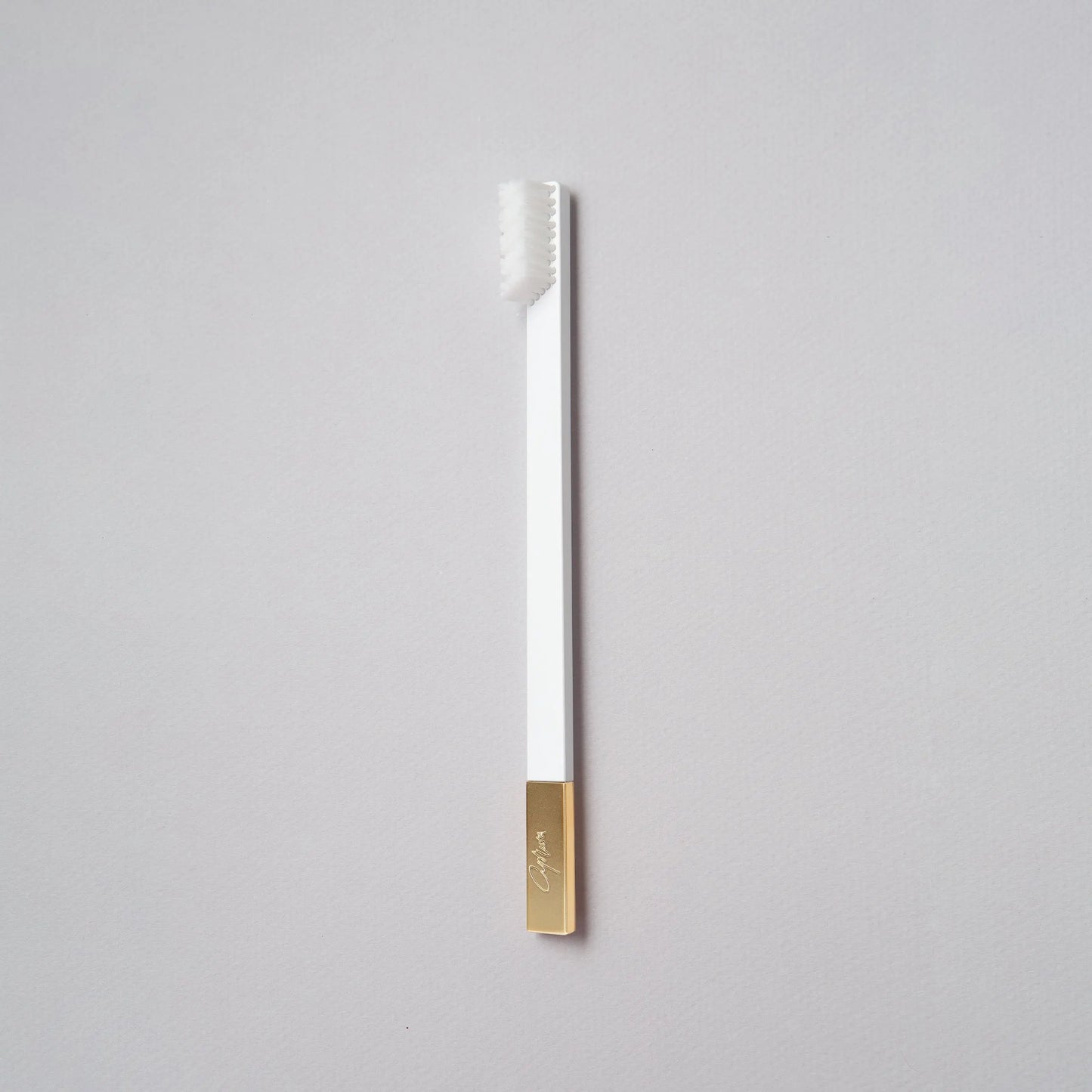 White Gold Toothbrush APRIORI