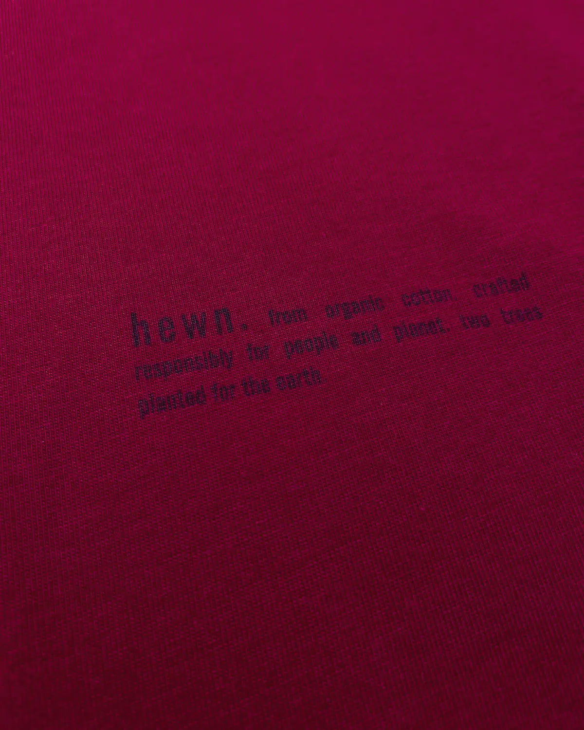 Womens Organic Cotton Relaxed-Fit Hoodie in Berry Red hewn.